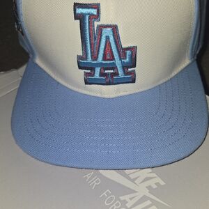 Two-Tone Cream and Light Blue Baseball Cap with Embroidered LA Logo